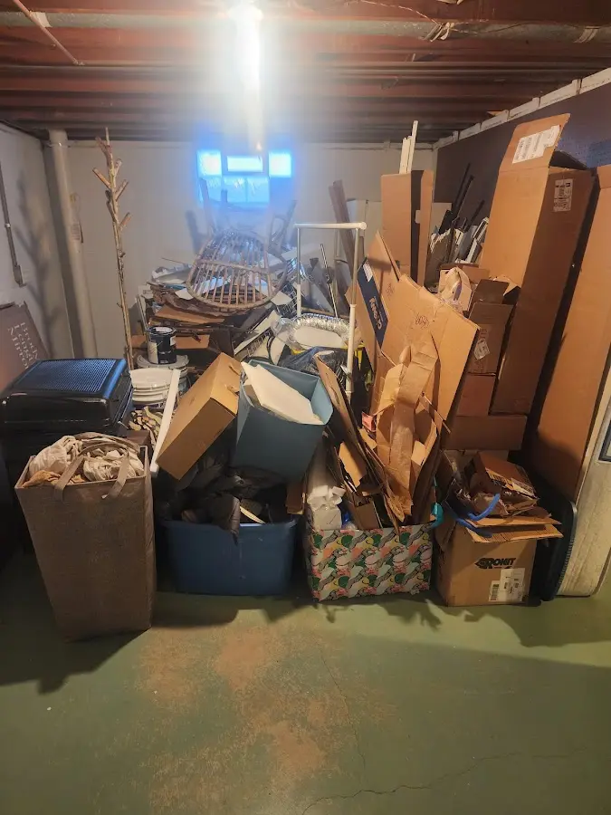 Roll-off dumpster container at job site for 2 Yard Dumpster Rental in Sugarcreek